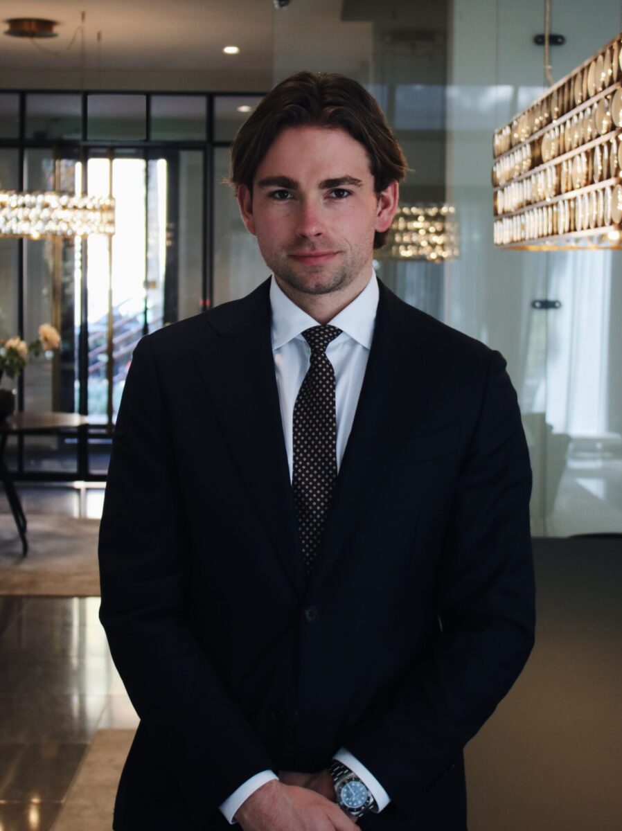 Justus Bloem” class=”visual”></picture> </div> <button> <span x-show=